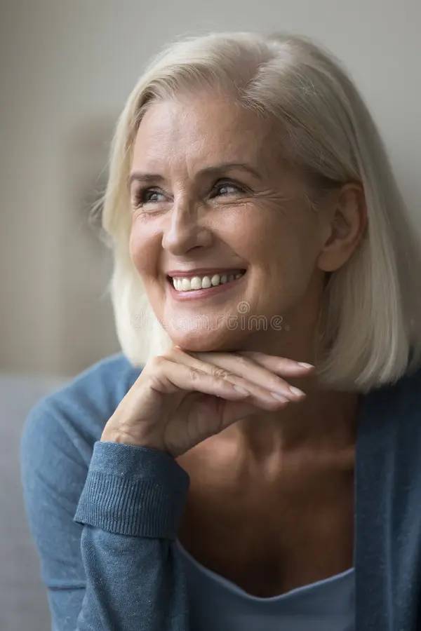 Ten mastercrafted porcelain veneers showing natural translucency and perfect symmetry